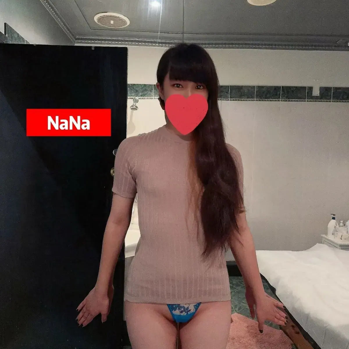 Masseuse posing in a treatment room at 161 Chatswood Erotic Massage in Sydney