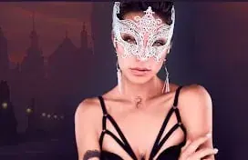 Masseuse wearing a white lace mask and black lingerie at Sweet Massage in Prague